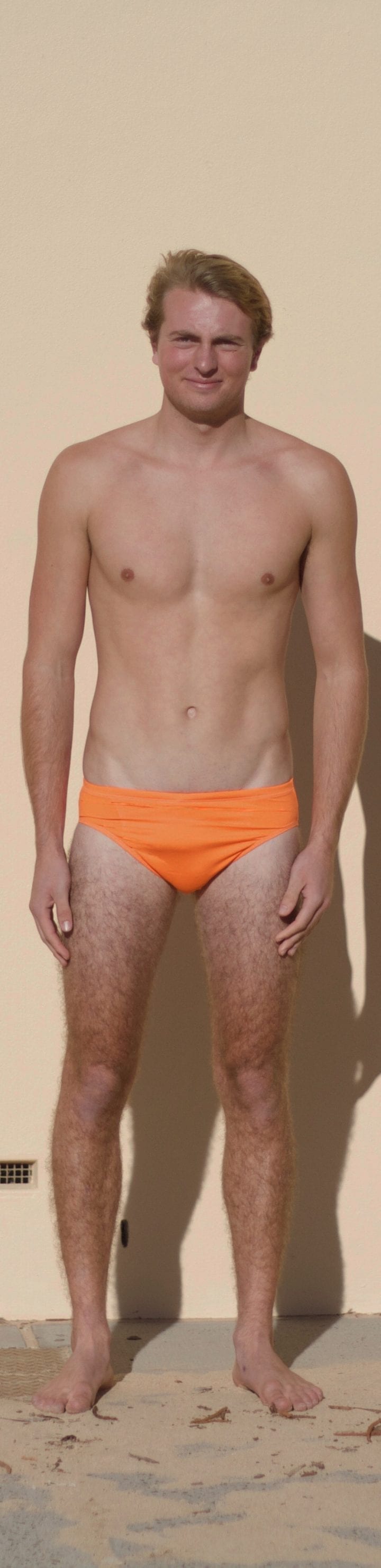orange mens swimmmers front scaled